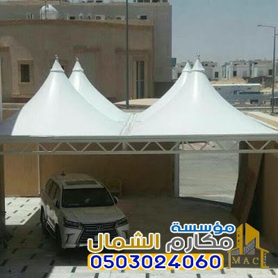 مظلات هرميه في حي الرمال